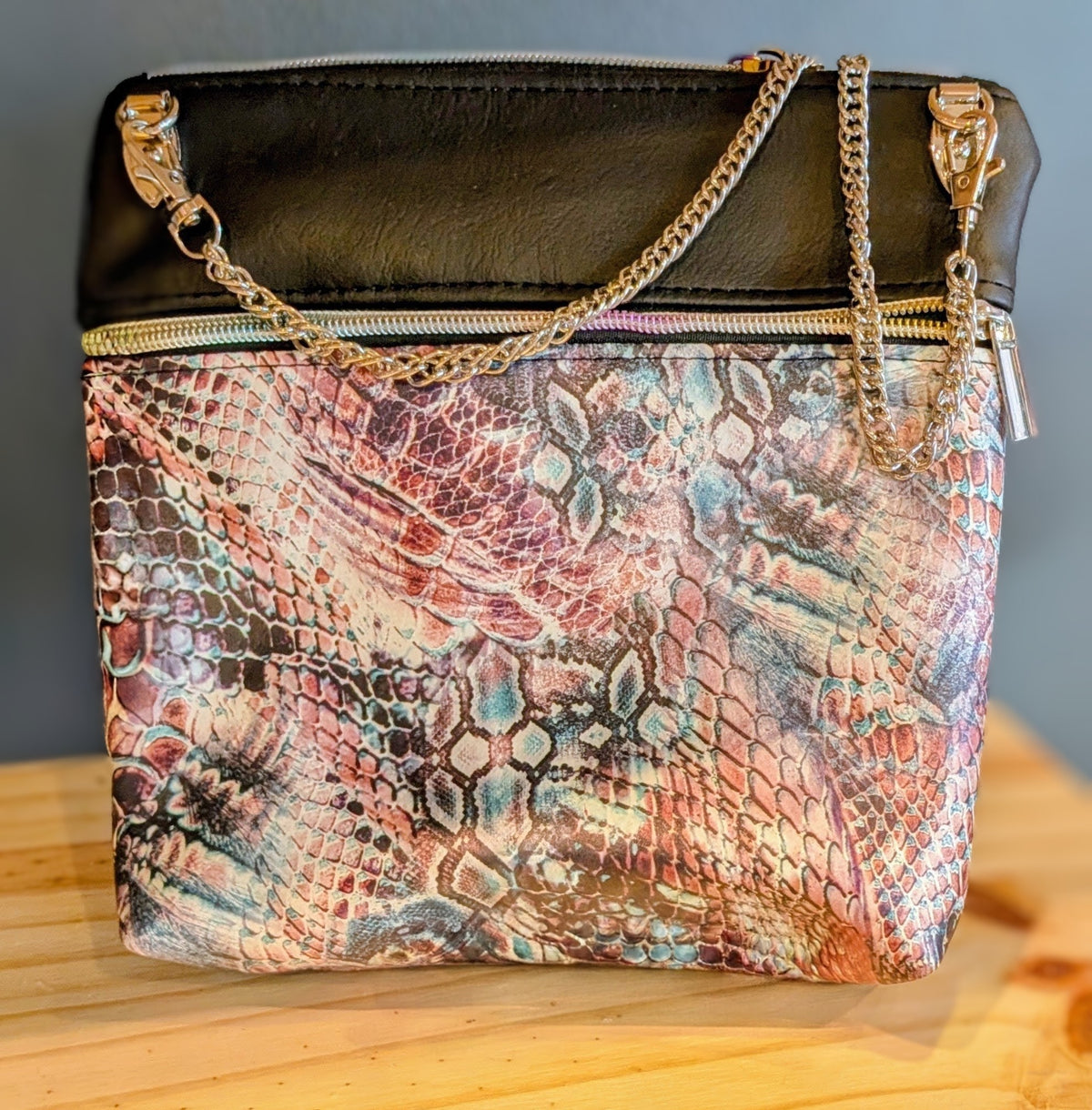 Black and red faux skin purse