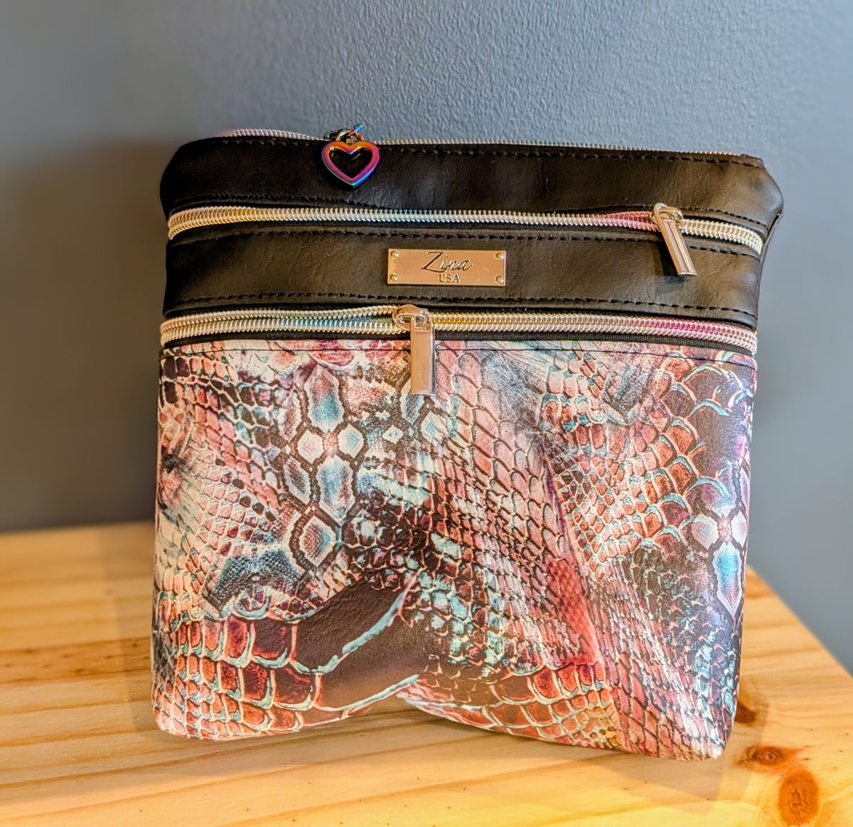 Black and red faux skin purse